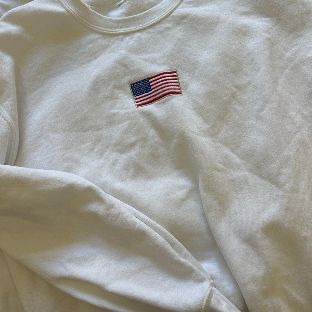 White Sweatshirt with American Flag Patch